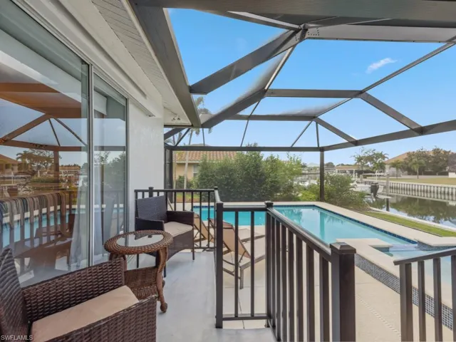 Swimming pool featuring a water view