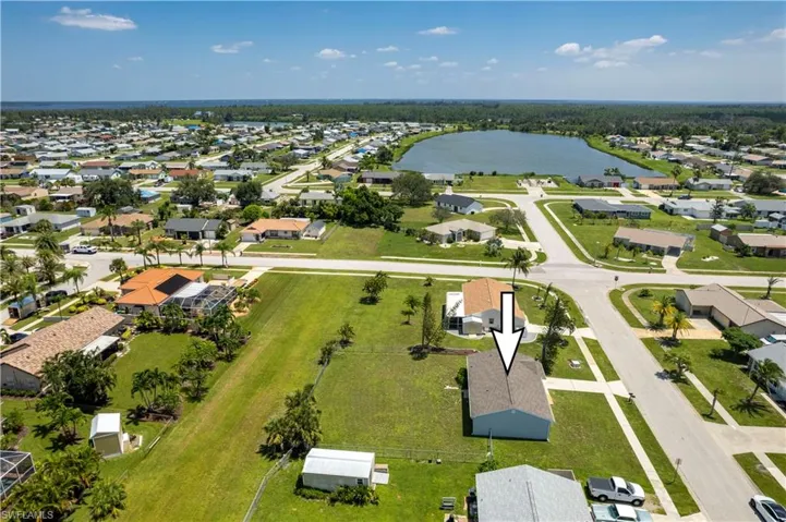 Bird's eye view with a residential view and a water view