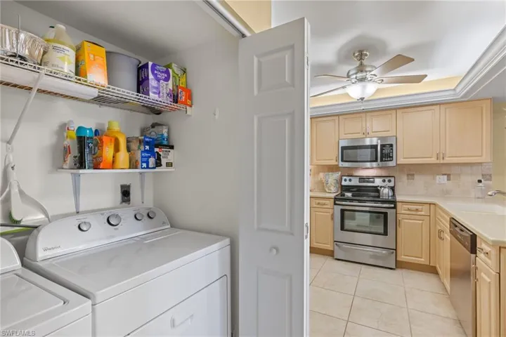 Laundry area is adjacent to the kitchen.