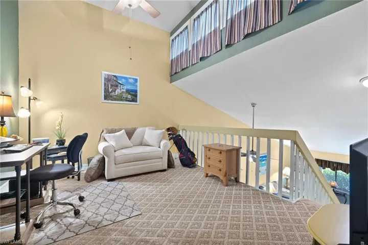 This loft offers additional windows for added light and is a great space to utilize for a den or office.