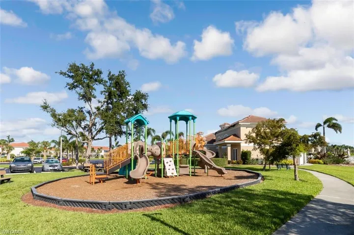 Community jungle gym featuring a yard