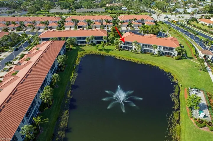 Aerial overview of property's location with a nearby body of water
