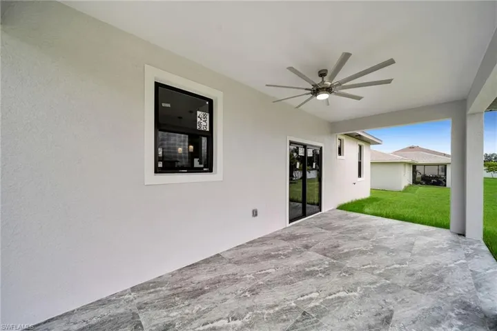 View of patio with ceiling fan