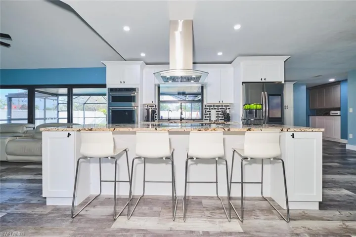 Upon entering the home you walk into a brand new kitchen.  Family room to the left and dining/den to the right.