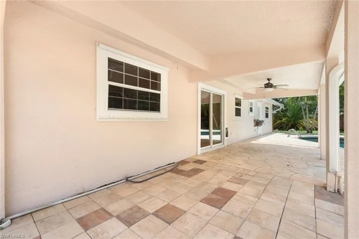 View of patio with ceiling fan