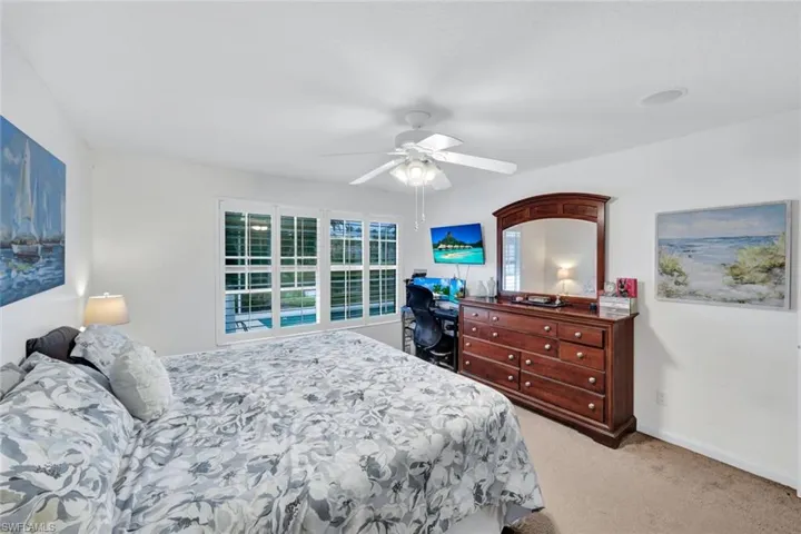 Bedroom featuring white walls and neutral carpet