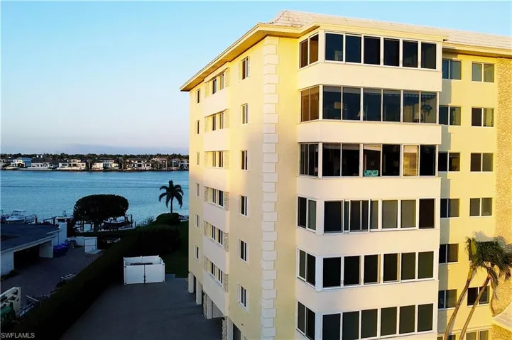 View of building exterior featuring a water view
