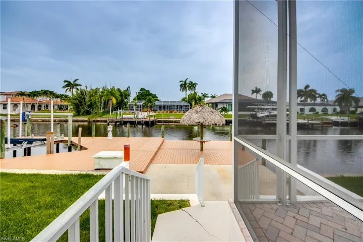 Dock area featuring a water view.  Dock is 70 feet LONG !!!