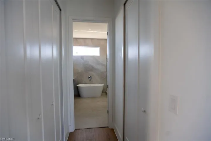 Hall with light wood-type flooring