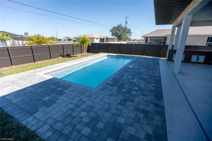 View of pool with a patio area