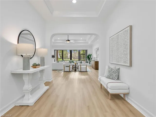 Open airy foyer showing beautiful living area