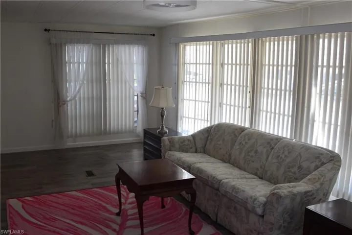 Living area with wood finished floors