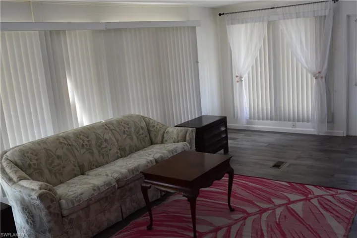 Living room featuring wood finished floors