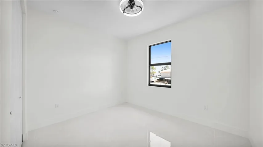 Empty room with baseboards