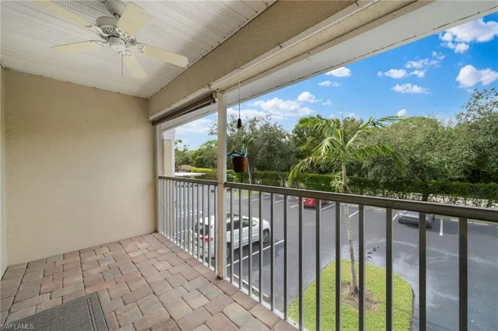 Balcony featuring ceiling fan