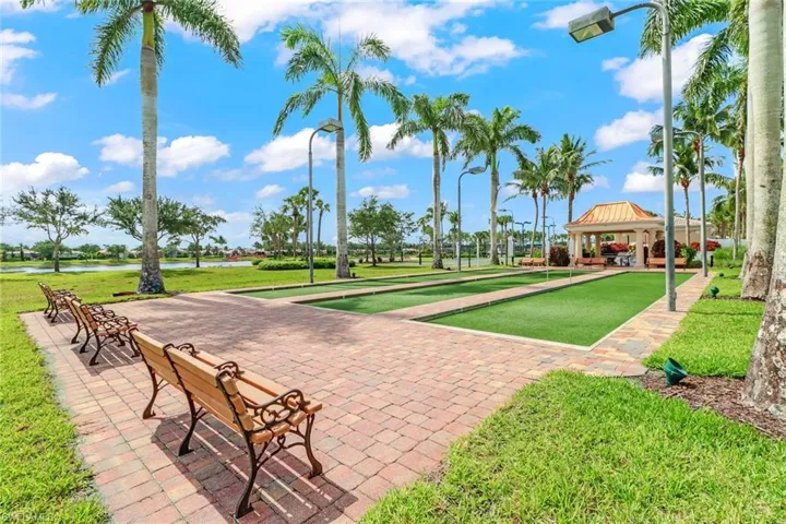 View of property's community featuring a gazebo and a water view