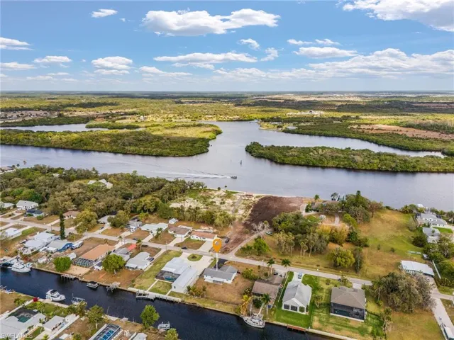 Aerial view of residential area with a large body of water