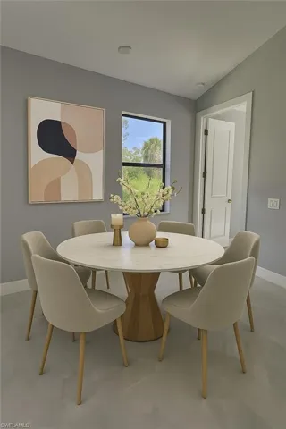 Dining area featuring baseboards
