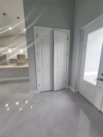 Double door entry to office or extra bedroom