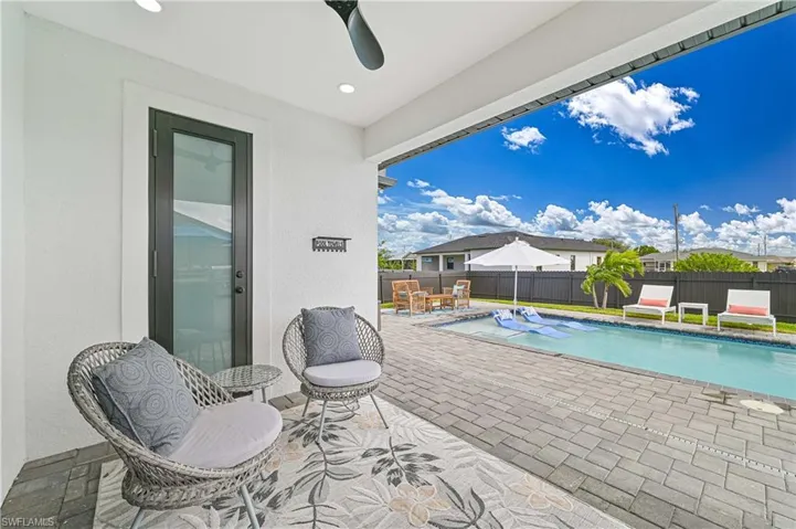 View of pool featuring a fenced in pool, a patio area, and a fenced backyard