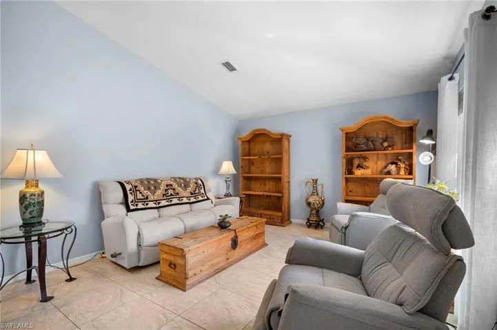 Living room with vaulted ceiling