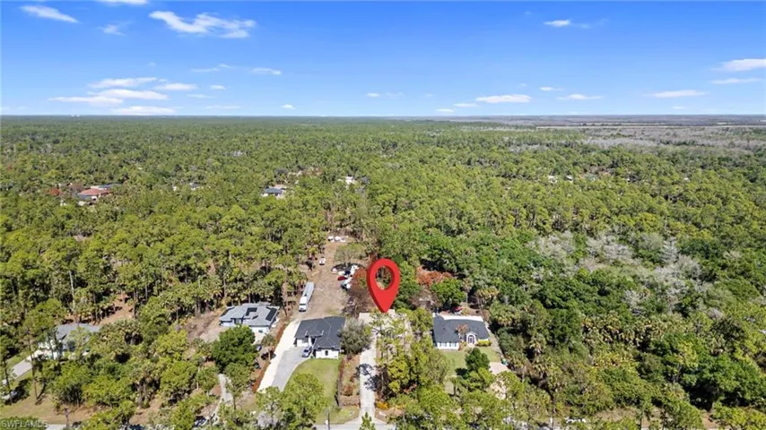 Drone / aerial view of a heavily wooded area