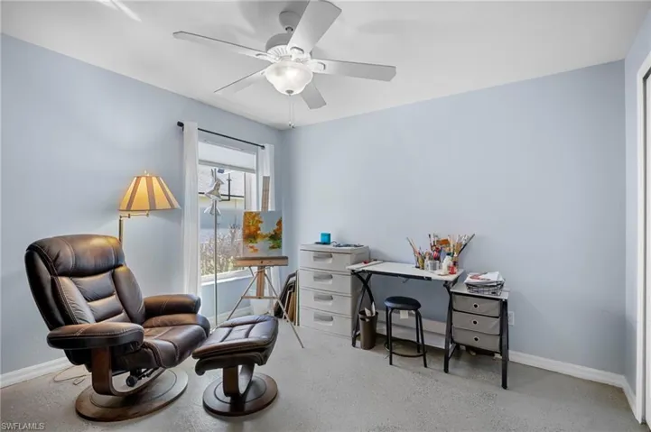 Office with baseboards and a ceiling fan