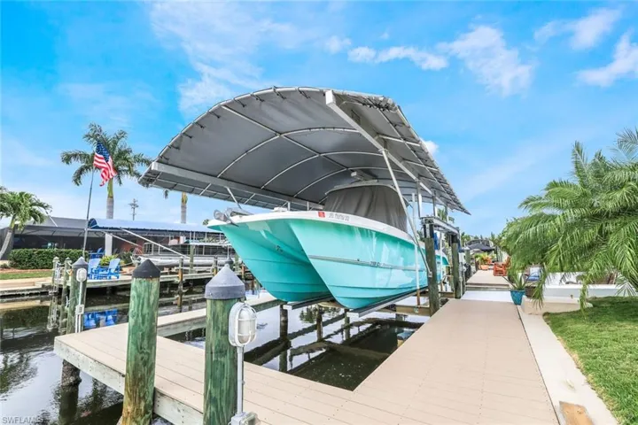 View of dock with a water view