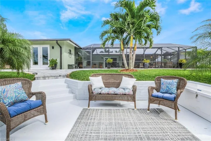 View of patio / terrace featuring glass enclosure and french doors