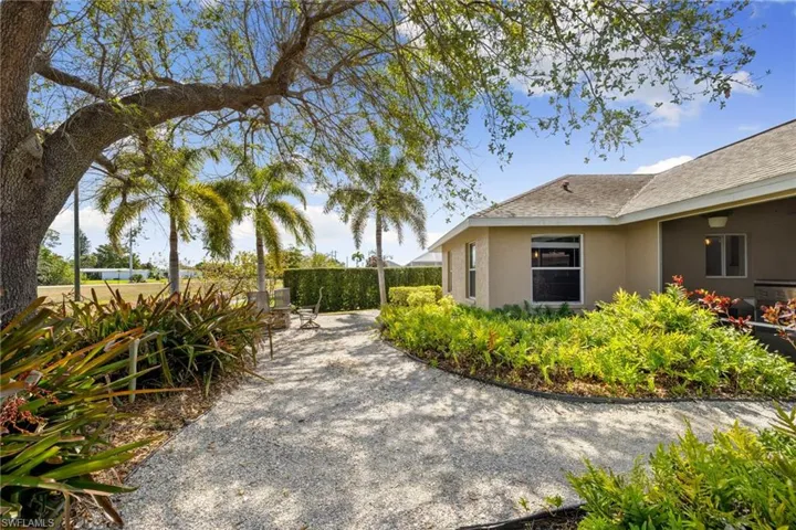 Surrounding community featuring a patio area and fence