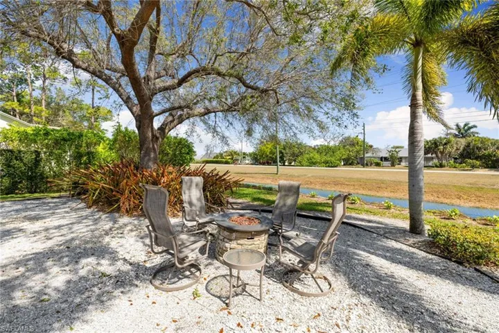 View of patio / terrace featuring an outdoor fire pit
