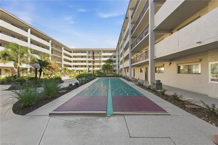 View of community with shuffleboard