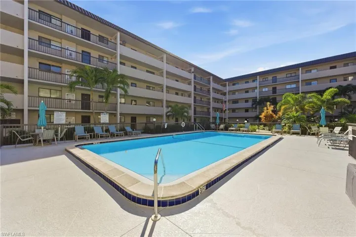 Community pool featuring a patio area
