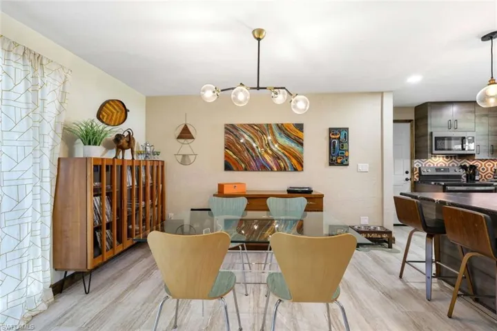 Dining room featuring light wood-type flooring