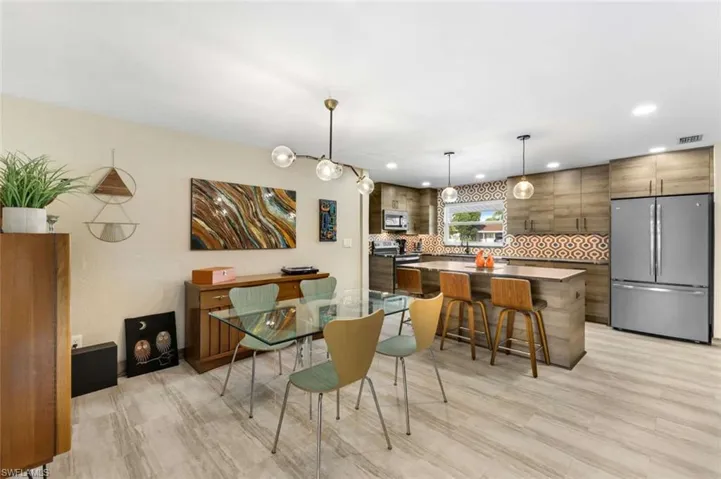 Dining area featuring light hardwood / wood-style floors