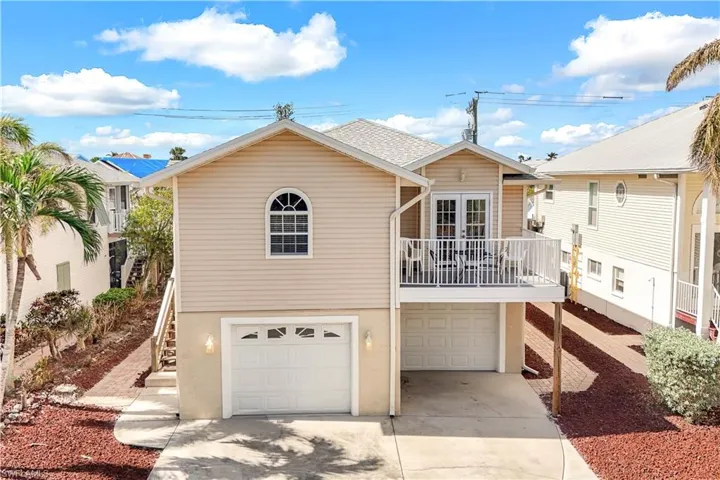 View of front of home featuring a garage