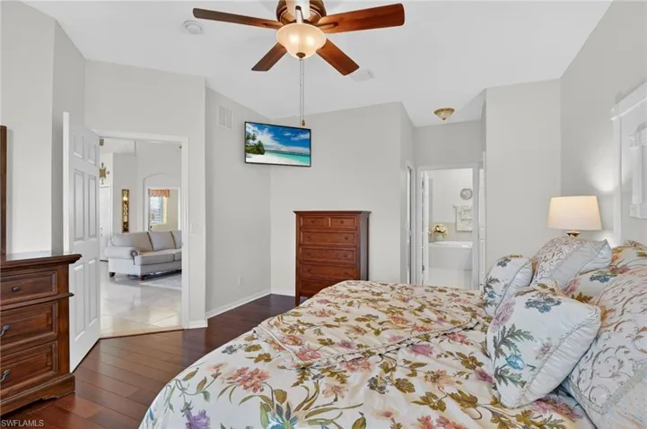 Primary bedroom with sliders that lead to the lanai