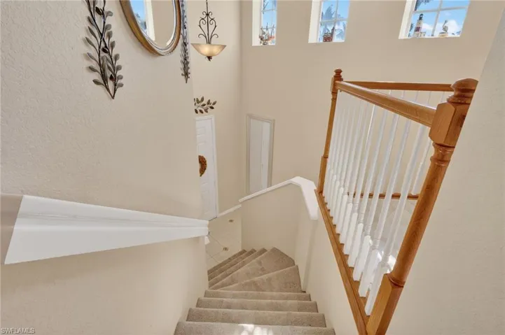 Coach home style condo with stairs to main living area.