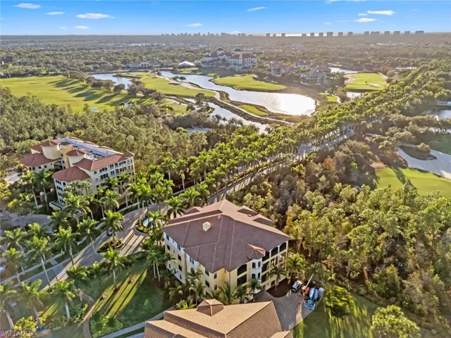 Bird's eye view of a local golf course and a large body of water