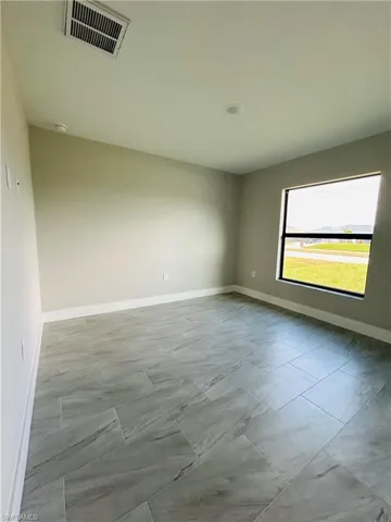 Unfurnished bedroom with a closet