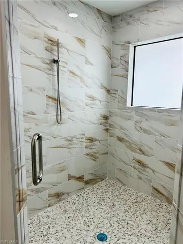 Bathroom with an enclosed shower