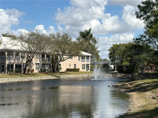 CONDO OVERLOOKS THE LAKE and WATER FEATURE.......CONDO IS END UNIT IN THIS PHOTO