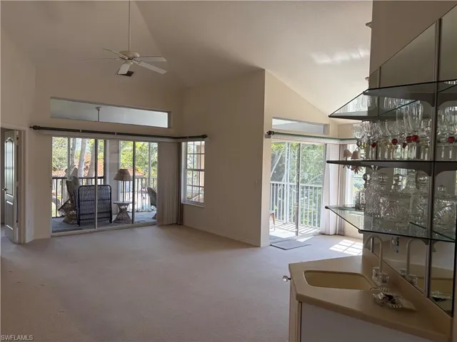 VAULTED CEILINGS AND SLIDING GLASS DOORS TO LANAI