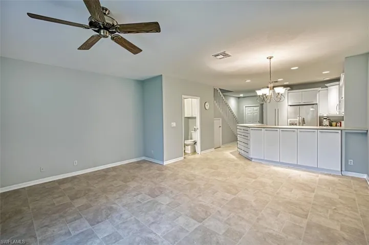 Bathroom with vanity, tile patterned flooring, and toilet