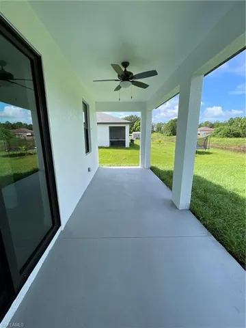 View of patio with ceiling fan