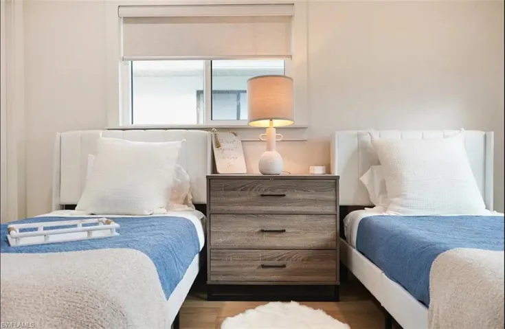 Bedroom with wood finished floors