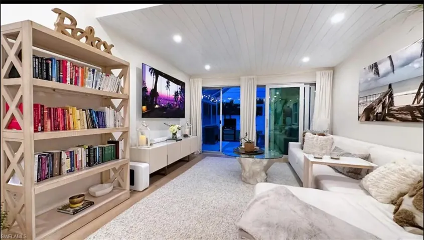 Living area featuring recessed lighting and wood ceiling