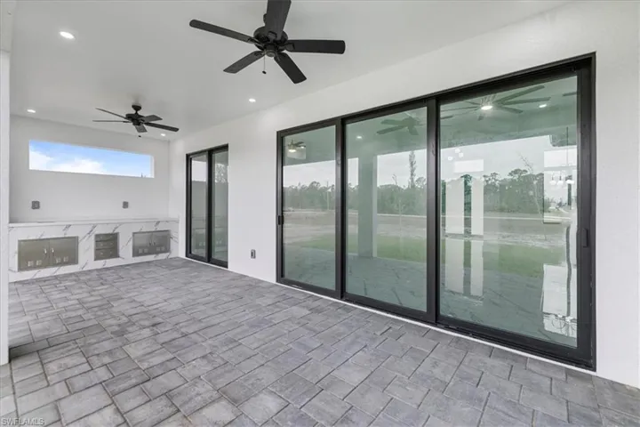 View of patio / terrace featuring ceiling fan