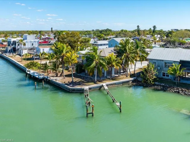 Aerial view of residential area with a nearby body of water