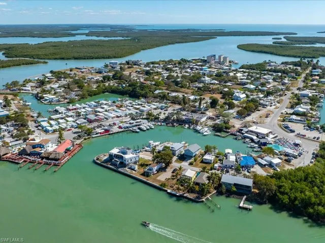 Aerial overview of property's location featuring a large body of water